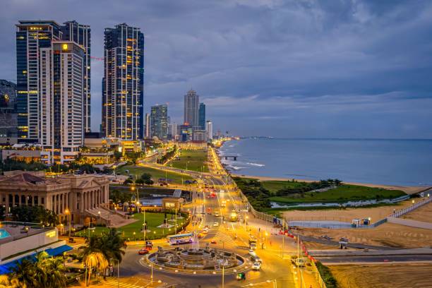 Colombo, Sri Lanka – February 08, 2023: An urban waterfront street scene with modern high-rise buildings in Colombo, Sri Lanka