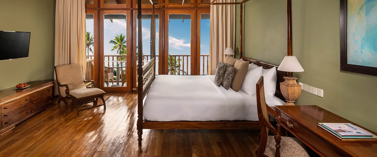Bedroom of a themed suite with plunge pool